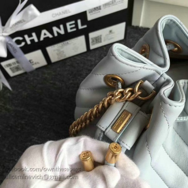 Ch**el lambskin drawstring bucket bag light blue