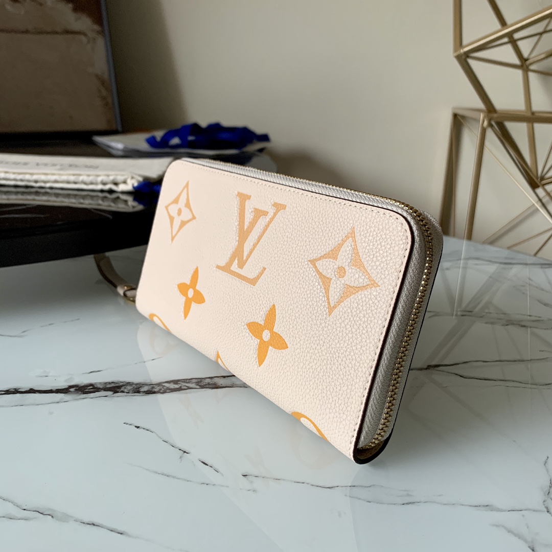 l0vis Vvtt0n by the pool zippy wallet monogram empreinte in cream m80402 19.5 x 10.5 x 2.5 cm