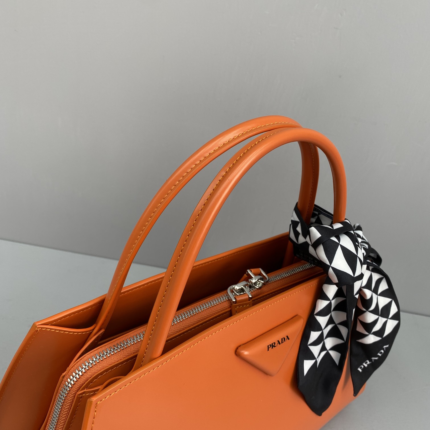 Pra*a miuccia x raf simons orange 33 x 18 x 13.5 cm