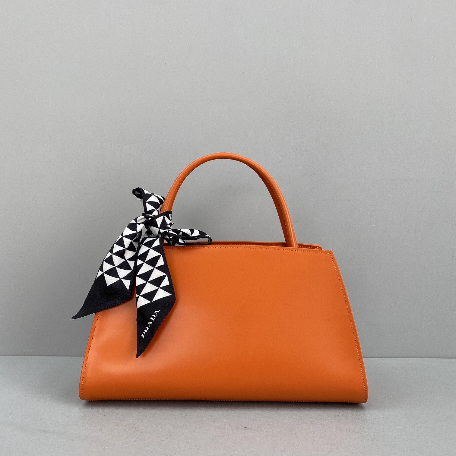 Pra*a miuccia x raf simons orange 33 x 18 x 13.5 cm
