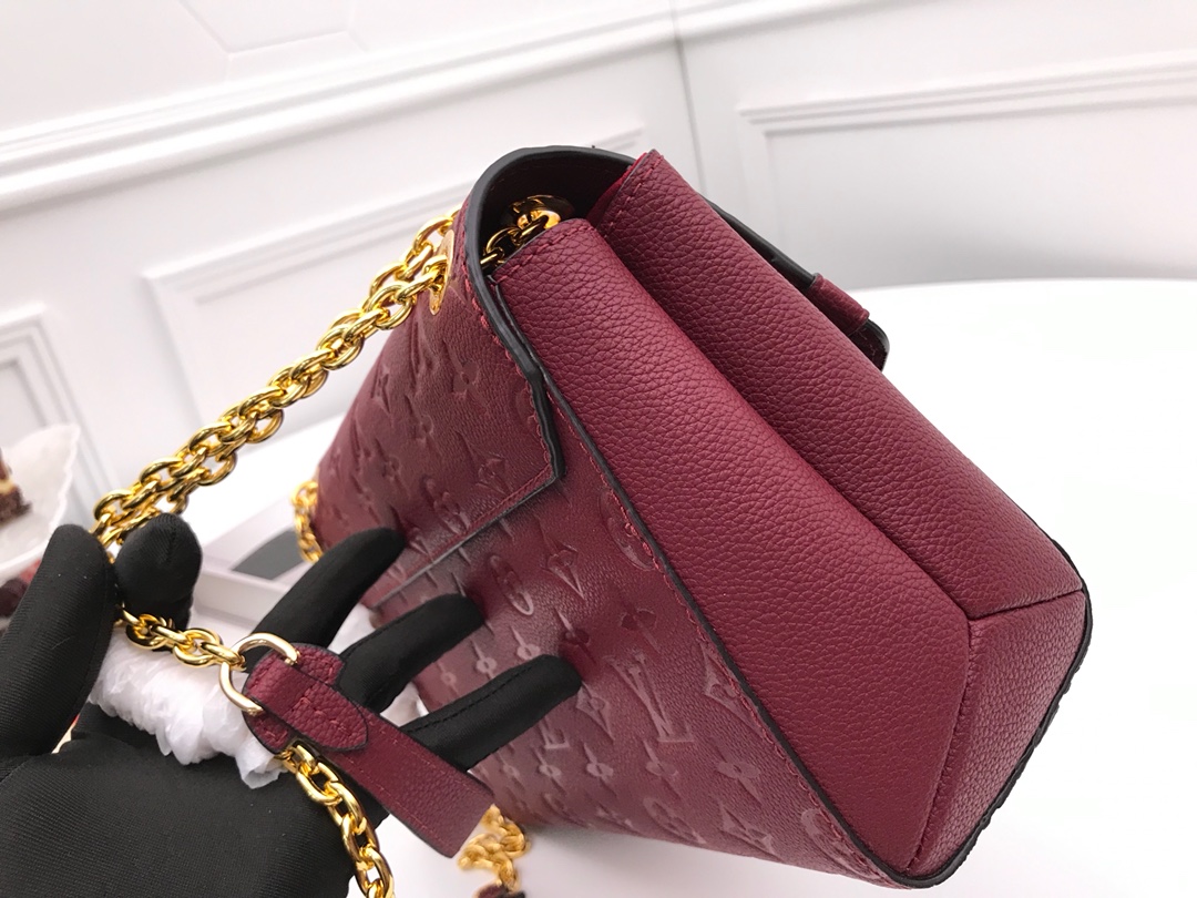 l0vis Vvtt0n vavin pm monogram empreinte leather scarlet m44151 26 x 20 x 8 cm