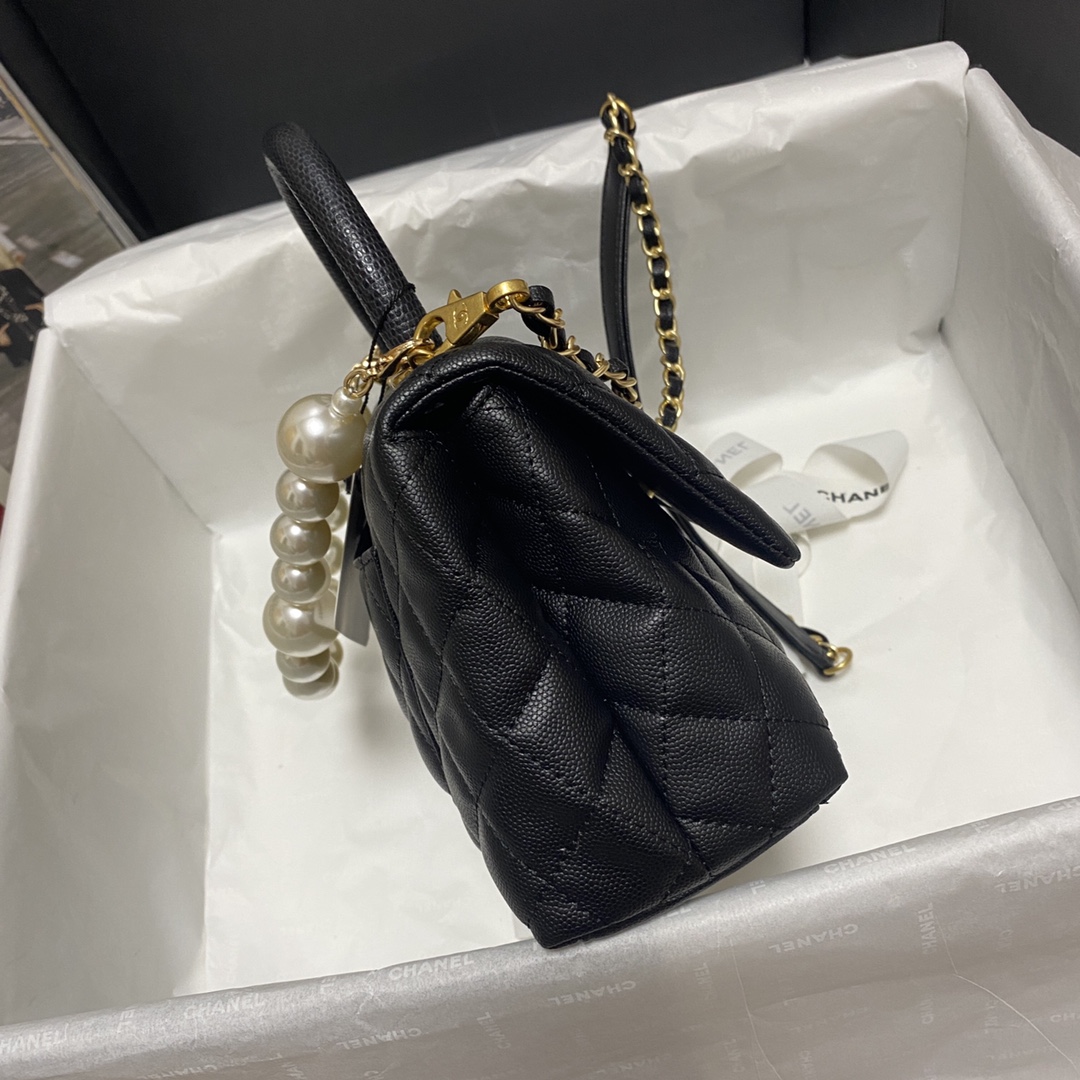 Ch**el flap bag with black top handle grained calfskin gold metal black a92990 23 cm