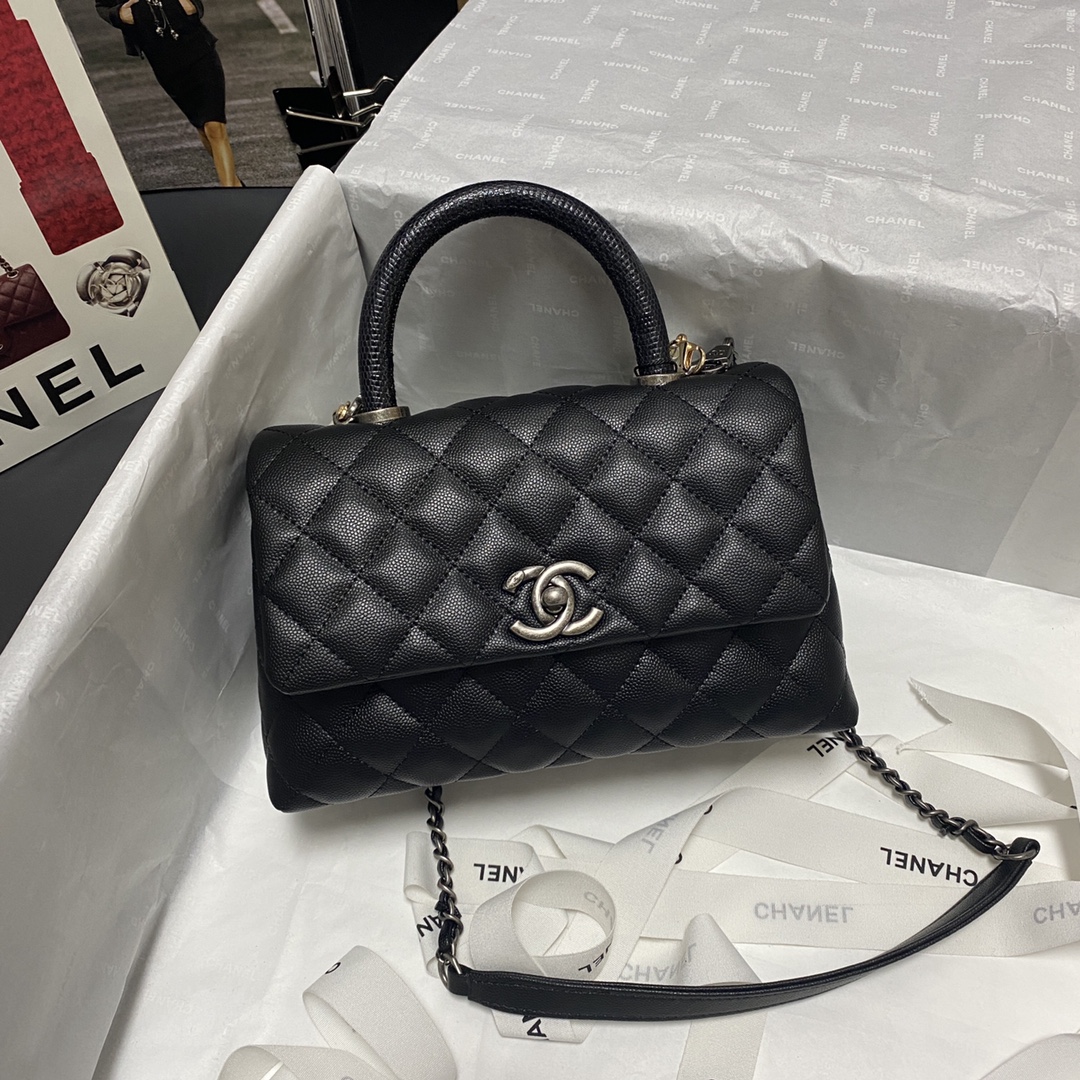 Ch**el flap bag with black top handle grained calfskin silver metal black a92990 23 cm