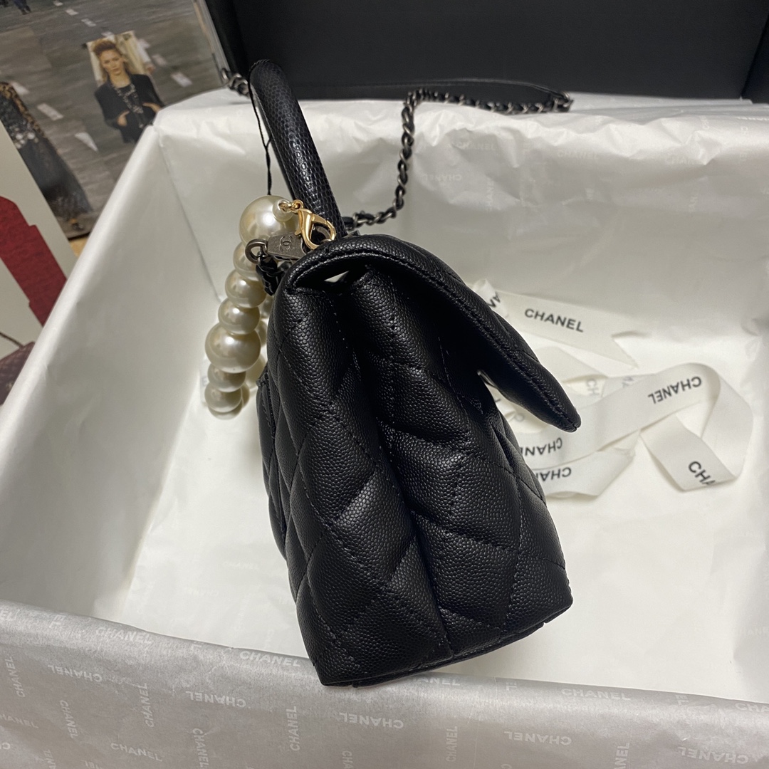 Ch**el flap bag with black top handle grained calfskin silver metal black a92990 23 cm