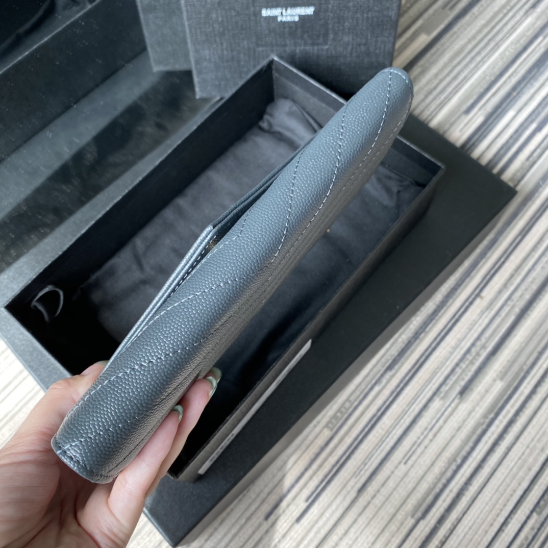 Y51 large monogram flap wallet in grain de poudre embossed leather blue 372264 19 x 11 cm