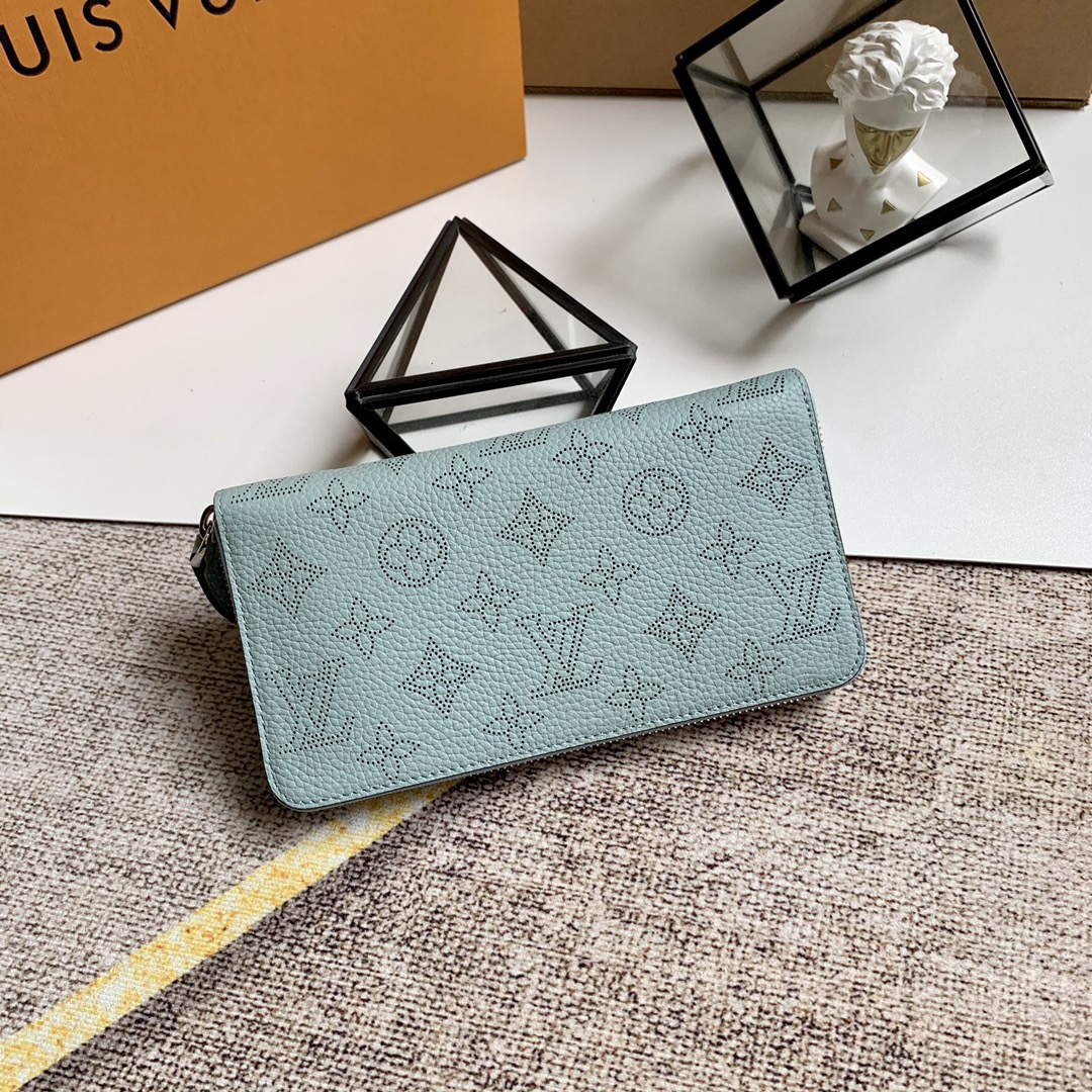 l0vis Vvtt0n zippy wallet monogram perforations mahina leather ver lagon m61867 19 x 10 cm