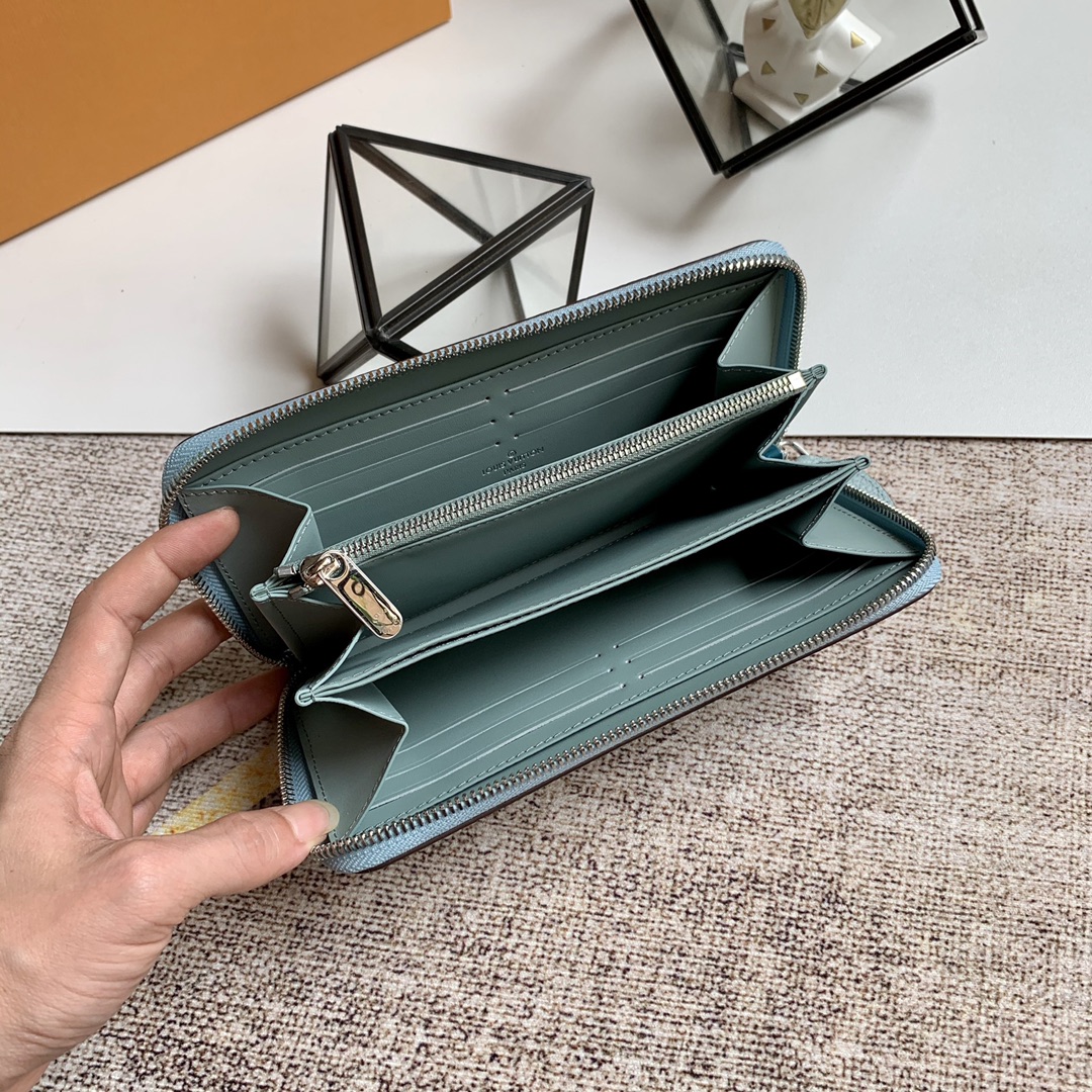 l0vis Vvtt0n zippy wallet monogram perforations mahina leather ver lagon m61867 19 x 10 cm