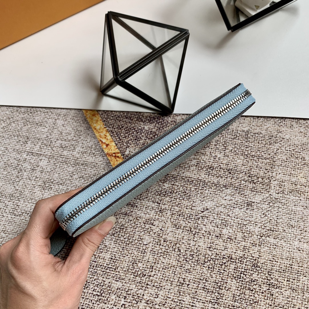 l0vis Vvtt0n zippy wallet monogram perforations mahina leather ver lagon m61867 19 x 10 cm