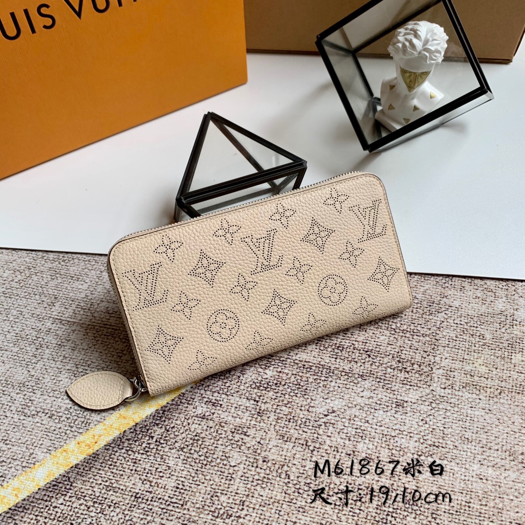 l0vis Vvtt0n zippy wallet monogram perforations mahina leather creme m61868 19 x 10 cm