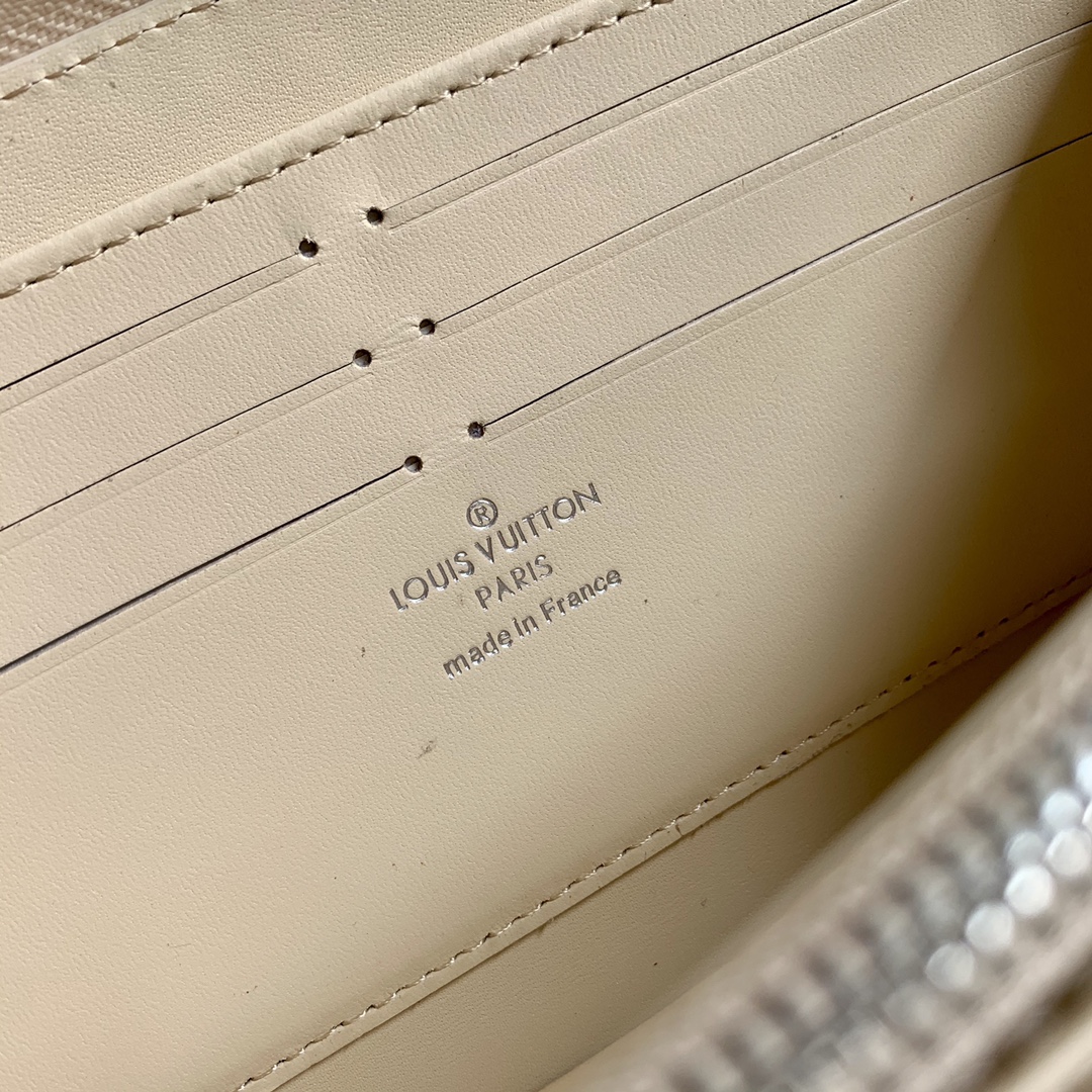l0vis Vvtt0n zippy wallet monogram perforations mahina leather creme m61868 19 x 10 cm