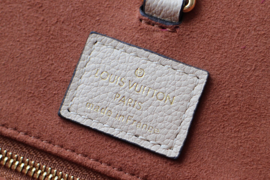 l0vis Vvtt0n fold tote mm monogram empreinte leather creme m45409 23 x 28 x 19 cm