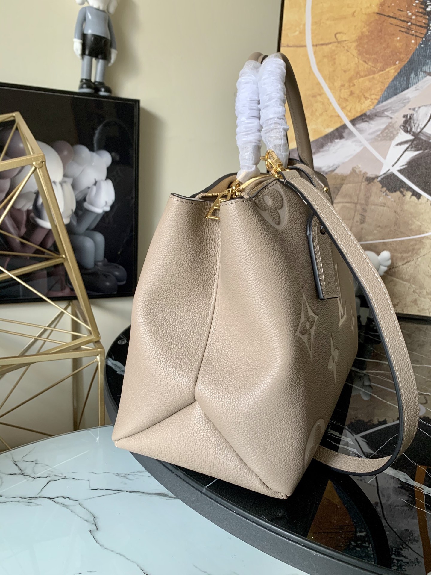 l0vis Vvtt0n grand palais biocolor monogram empreinte pattern beige and creme m45842 34 x 24 x 15 cm