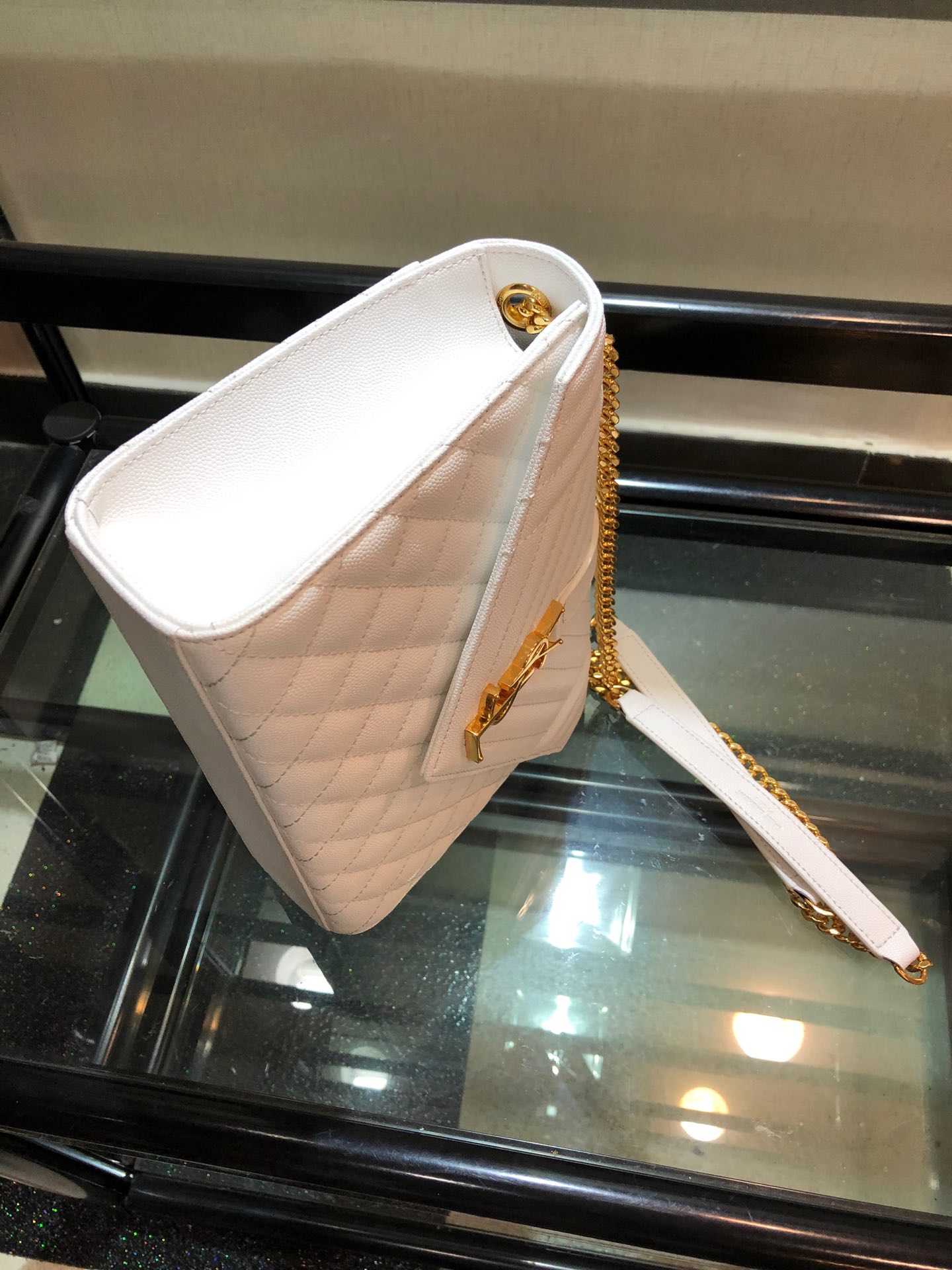 Y51 envelope medium bag in grained leather white 600185 24 x 7.5 x 18 cm