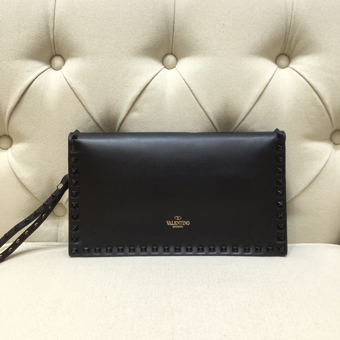 Va1e*ntin0 garavani rockstud clutch with hand holder black metal 28 cm