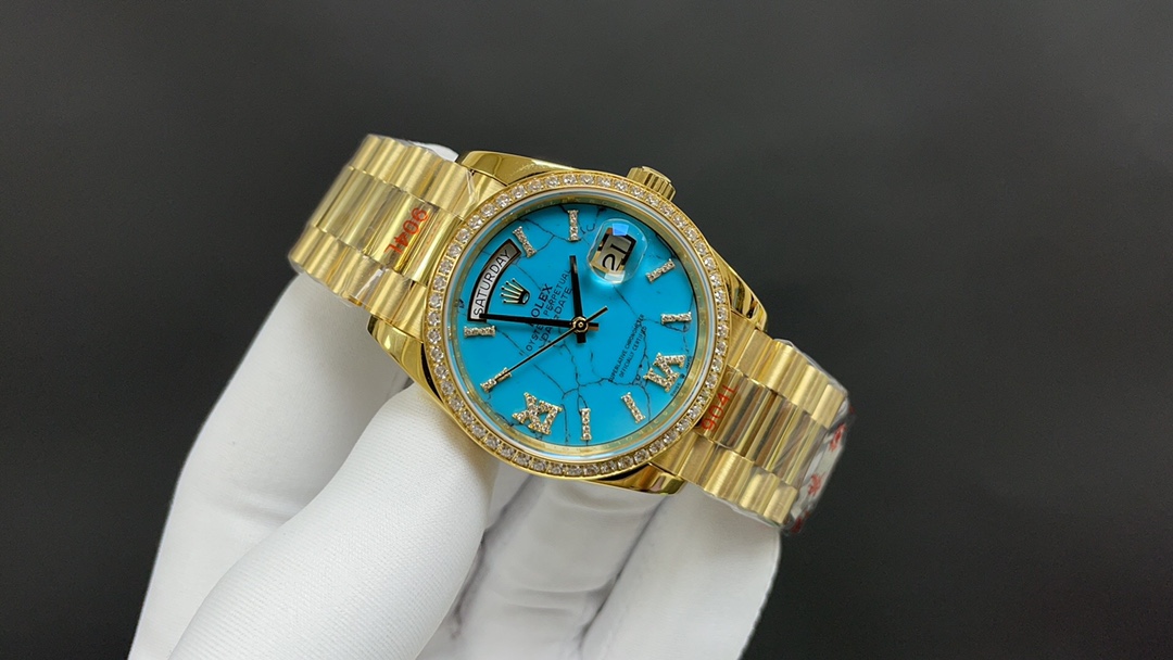 R01ex oyster perpetual day and date golden and blue 36 mm 2836